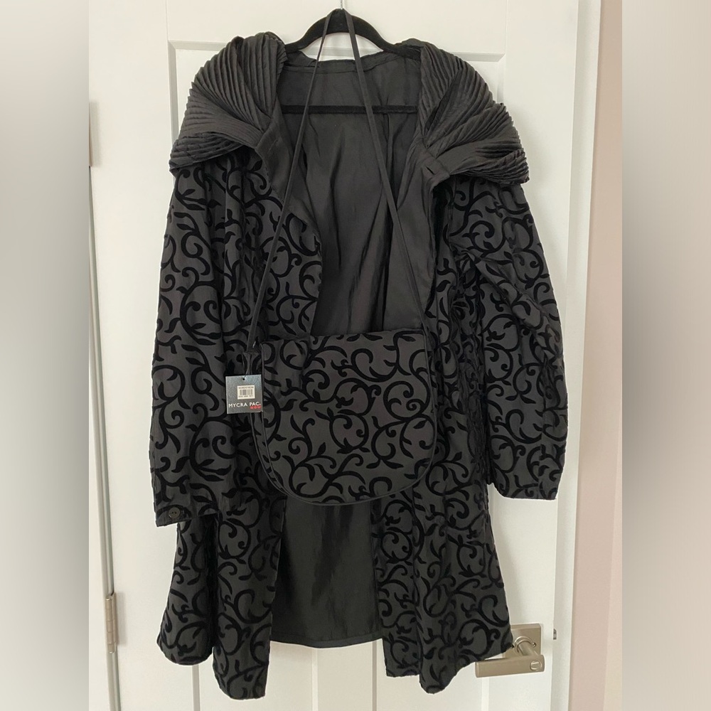Mycra Pac Lightweight reversible rain coat